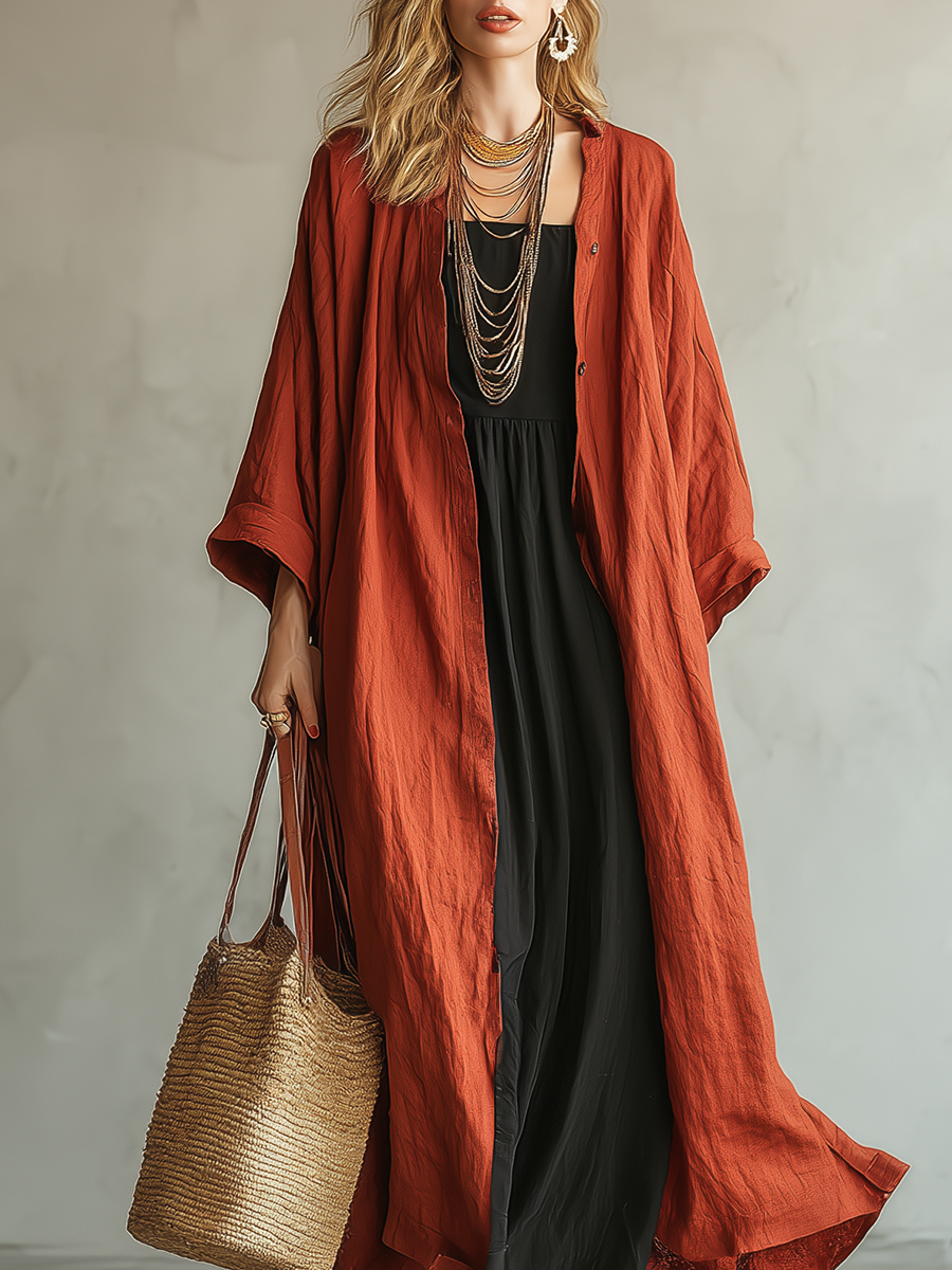 Terracotta Colored Bohemian Style Cardigan Paired With A Black Long Skirt