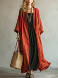 Terracotta Colored Bohemian Style Cardigan Paired With A Black Long Skirt